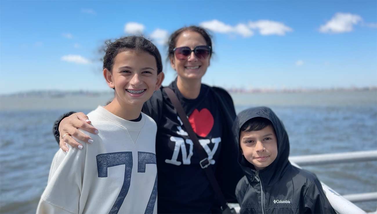 Family enjoying New York Harbor cruise